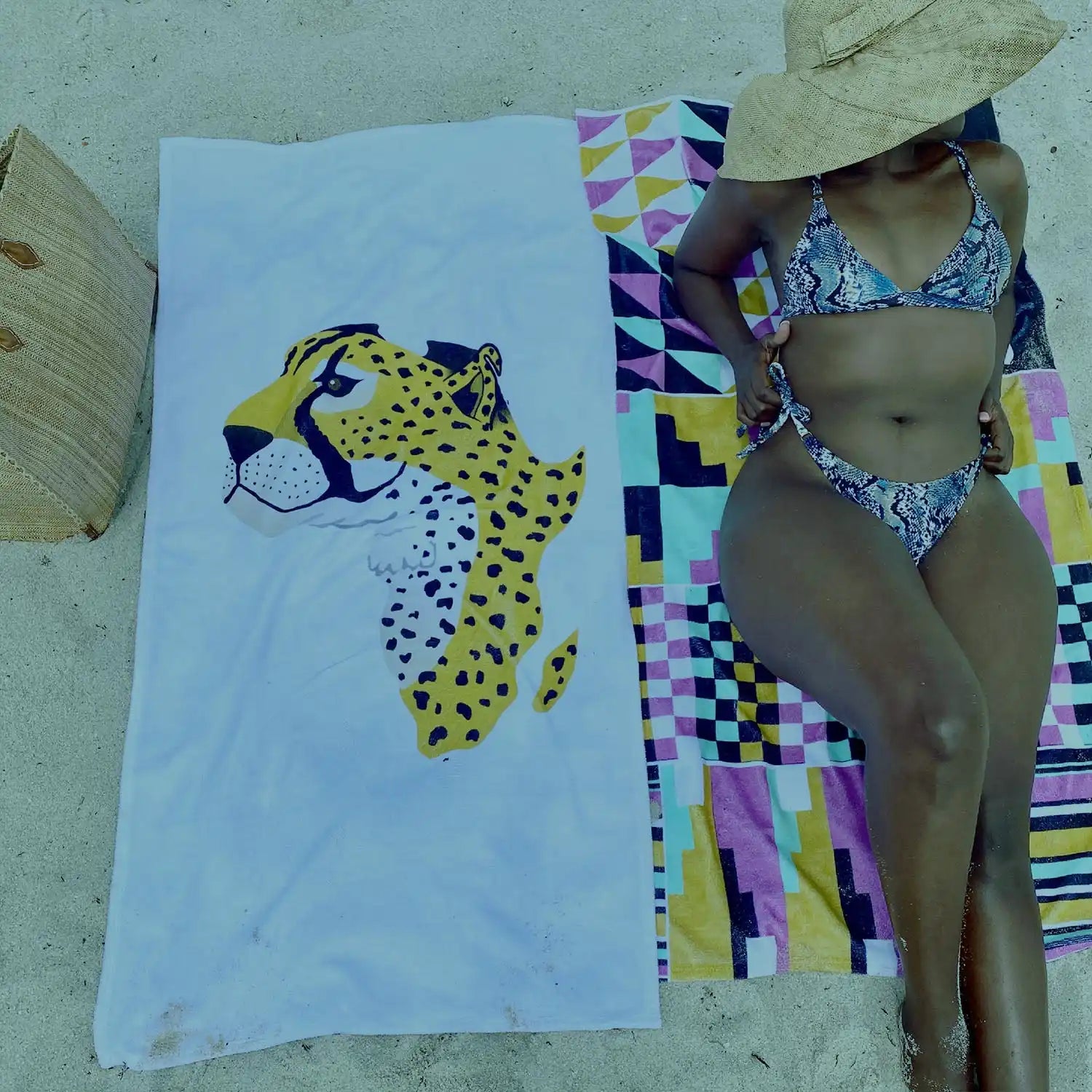 Woman in snakeskin bikini.